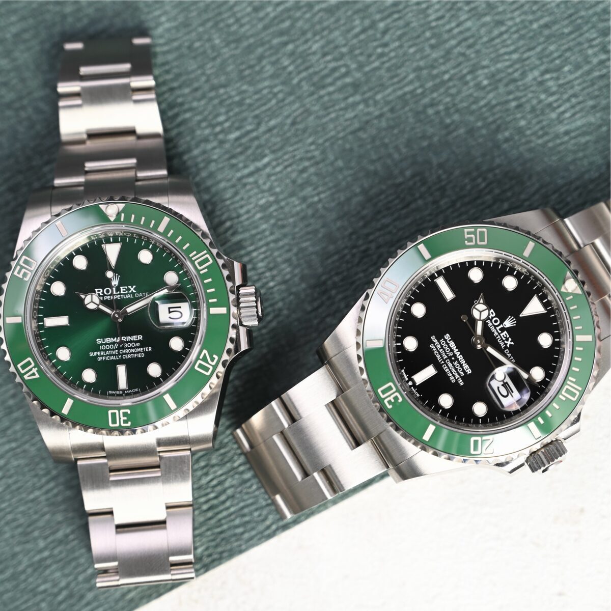 Zwei Rolex Submariner in Edelstahl mit grüner Lünette Zwei Rolex Submariner in Edelstahl mit grüner Lünette